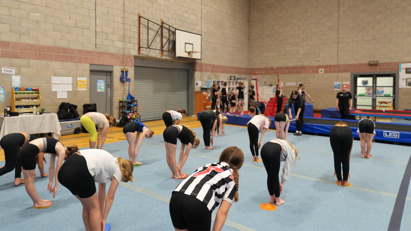 north east gymnastics recreational class warming up
